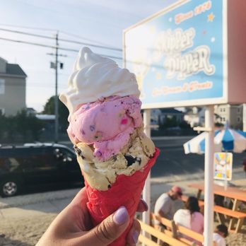 Skipper Dipper - S'mores and cotton candy topped with cupcake flavored soft serve on a pink vanilla cone! Amazing! - Ice Cream & Frozen Yogurt Near Me - Long Beach Township, New Jersey