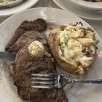 Tom Brown's Restaurant - Ribeye and loaded baked potato - Steakhouses Near Me - Huntsville, Alabama