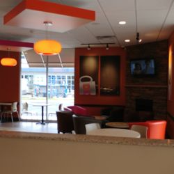 Dunkin' - Big area with chairs and a fireplace. Nice!