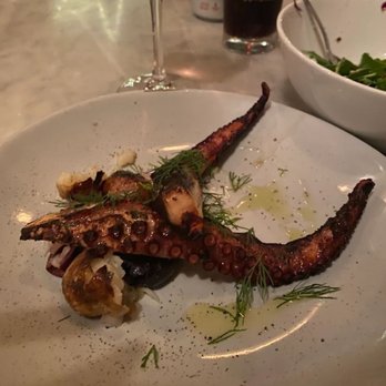 Milkflower - Wood Roasted Octopus Russet potatoes, shallots, Kalamata olives, dill - Pizza Near Me - Astoria, New York Milkflower - Wood Roasted Octopus Russet potatoes, shallots, Kalamata olives, dill - Pizza Near Me - Astoria, New York