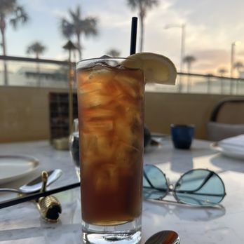 Maison Chinoise - Watching the sunset with a tall glass of ice tea - Dim Sum Near Me - Houston, Texas Maison Chinoise - Watching the sunset with a tall glass of ice tea - Dim Sum Near Me - Houston, Texas