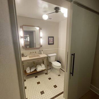 Hutton Hotel - Bathroom was very stylish. Loved the sliding door. Lots of sink space. - Hotels Near Me - Nashville, Tennessee Hutton Hotel - Bathroom was very stylish. Loved the sliding door. Lots of sink space. - Hotels Near Me - Nashville, Tennessee