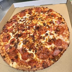 Piara Pizza - Eighteen-inch New York Style Meat Lovers Pizza -- foldable with extra-large slices, loaded with pepperoni, sausage, beef, ham and bacon.
