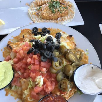 Tides Restaurant & Pub - Nachos and fish tacos - Seafood Near Me - Nahant, Massachusetts Tides Restaurant & Pub - Nachos and fish tacos - Seafood Near Me - Nahant, Massachusetts