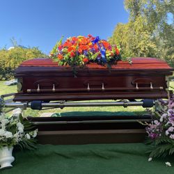 Carol's Corner Florist And Gifts - The flowers on top of the casket are from Carol's Corner.