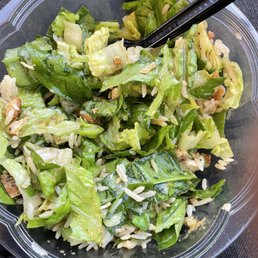 fresh greens with rice and chicken and a handful of other goodies