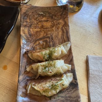 Shoku Izakaya - Pork kimchi gyozas with spicy soy chili sauce - Asian Fusion Near Me - Banff, Alberta Shoku Izakaya - Pork kimchi gyozas with spicy soy chili sauce - Asian Fusion Near Me - Banff, Alberta
