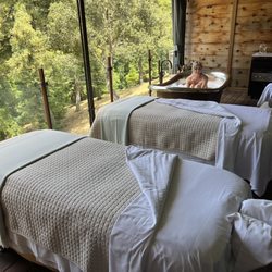 The Spa Alila - The soaking tub and massage tables overlooking the forest.