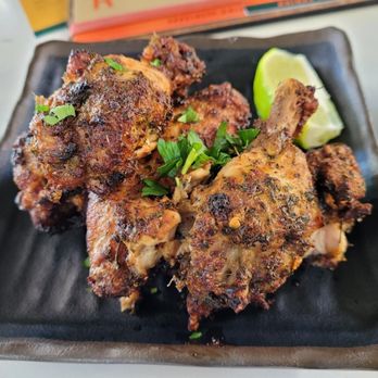 Zanzibar - Jerk chicken wings - Tiki Bars Near Me - Austin, Texas
