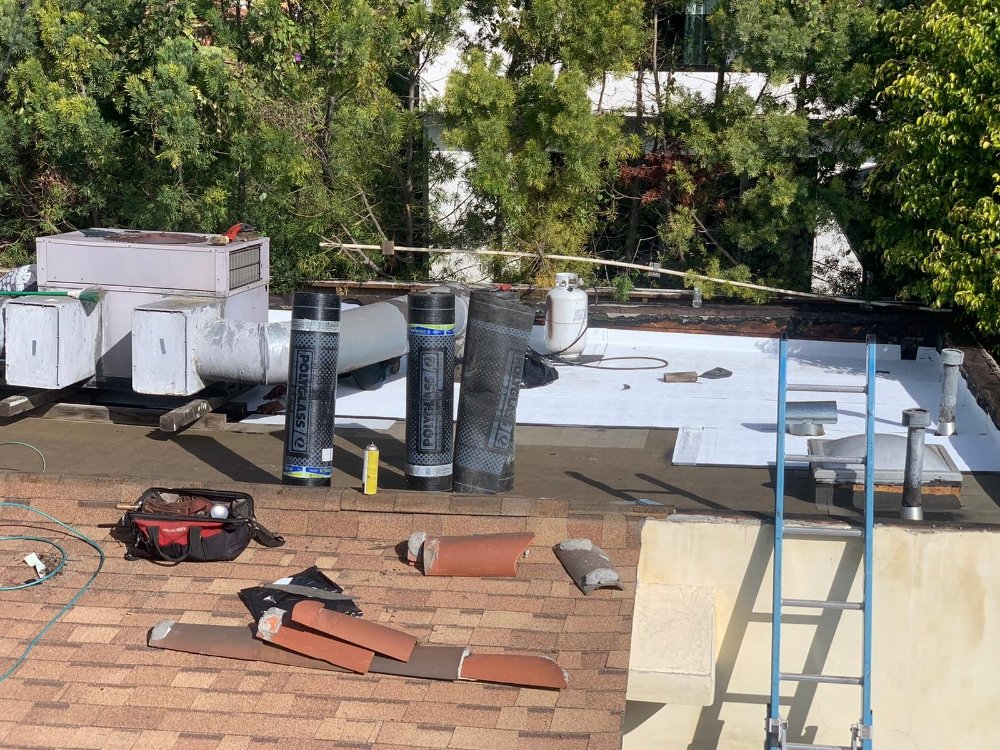 Slide of The Local Roofers and Builders