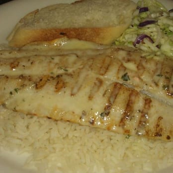 California Fish Grill - Garlic butter whitefish over rice - Seafood Near Me - Brea, California California Fish Grill - Garlic butter whitefish over rice - Seafood Near Me - Brea, California