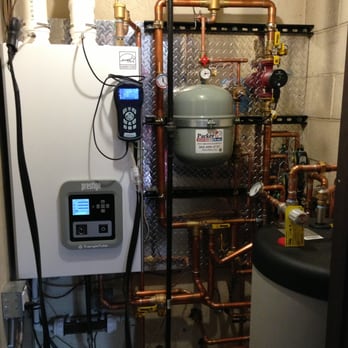 Parker - New boiler install being set up with combustion analyzer for max efficiency. - Heating & Air Conditioning/HVAC Near Me - Parker, Colorado Parker - New boiler install being set up with combustion analyzer for max efficiency. - Heating & Air Conditioning/HVAC Near Me - Parker, Colorado