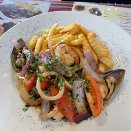 Seafood mix abs French fries. Seafood mix abs French fries.