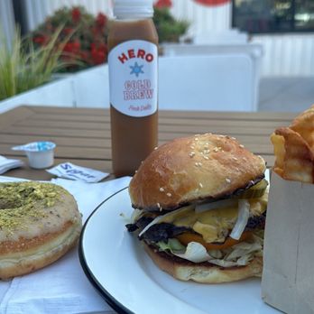 Hero Doughnuts & Buns - Pistachio Doughnut with Cheeseburger and fries - Donuts Near Me - Atlanta, Georgia