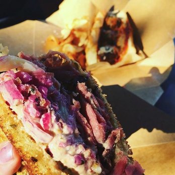 S'wich Bistro - Pastrami Swiss in a toasty buttery rye bread thats to die for. their home made saeuerkraut and their special wink wink sauce ;) - Breakfast & Brunch Near Me - Irvine, California