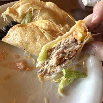 El Tecolote - Carnitas taco, they asked me if I wanted the carnitas crispy or soft, I got soft. As you can see this sucker is packed with meat. - Mexican Near Me - Camarillo, California El Tecolote - Carnitas taco, they asked me if I wanted the carnitas crispy or soft, I got soft. As you can see this sucker is packed with meat. - Mexican Near Me - Camarillo, California