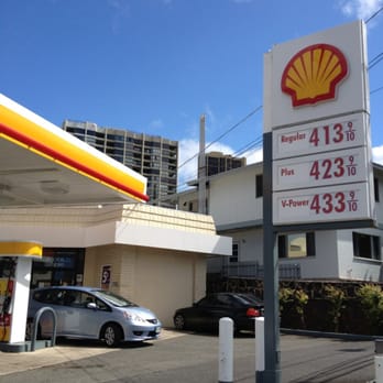 Shell - a shell gas station with a car parked in front of it - Gas Stations Near Me - Honolulu, Hawaii