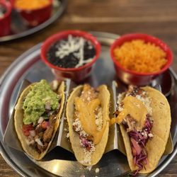 LA RANCHERITA GRILL & TEQUILA BAR - Street Tacos - Two fish tacos and one steak taco, beans and rice.