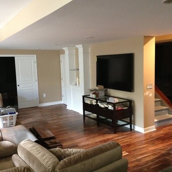 Finished Basements - a living room with hardwood floors - General Contractors Near Me - Harrison Township, Michigan Finished Basements - a living room with hardwood floors - General Contractors Near Me - Harrison Township, Michigan