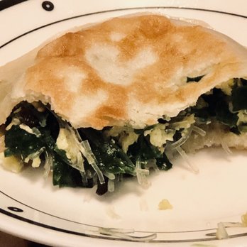 Shan Dong - The inside of the pancake stuffed with chives. Three pancakes in each order. - Chinese Near Me - Oakland, California