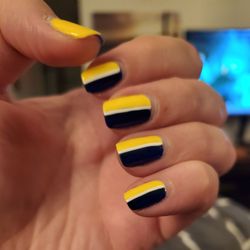 Modern Nails & Spa - My navy and yellow nails with a white accent stripe.