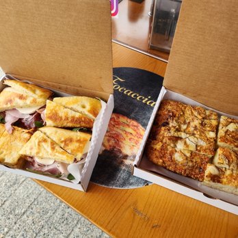 Focacciaza - two boxes of food on a table - Italian Near Me - Vancouver, British Columbia Focacciaza - two boxes of food on a table - Italian Near Me - Vancouver, British Columbia