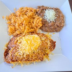 Yesenia's Mexican Food and Seafood - Tamale platter with rice and beans. Delicious!