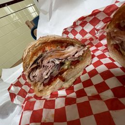 The Dan with lettuce, pickles, and onions