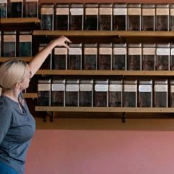 Havana Harbor Cigars - Jennifer Nichole adjusting the pipe tobacco