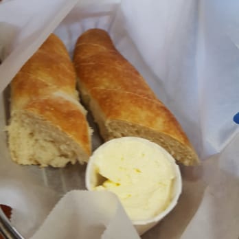 Chimento's Spaghetti House - Bread with garlic butter - Italian Near Me - Saint Cloud, Florida Chimento's Spaghetti House - Bread with garlic butter - Italian Near Me - Saint Cloud, Florida
