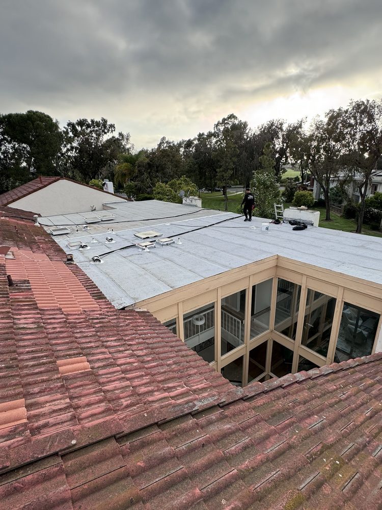 Slide of New Heights Roofing
