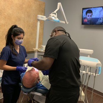 Today Dental of Denton - Dr. Price working on a patient! - General Dentistry Near Me - Denton, Texas Today Dental of Denton - Dr. Price working on a patient! - General Dentistry Near Me - Denton, Texas