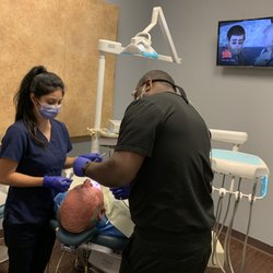 Today Dental of Denton - Dr. Price working on a patient!