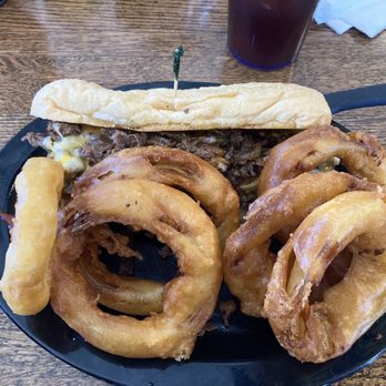 Bummie's On Main - Philly Steak with a side of onion rings. - Burgers Near Me - Newark, Ohio
