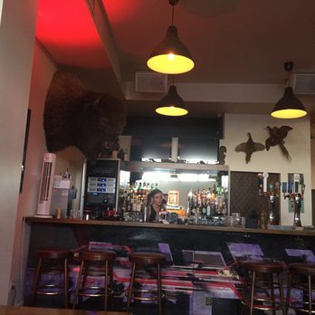 Finch & Barley - a bar with a bear head on the wall - Middle Eastern Near Me - North Vancouver, British Columbia Finch & Barley - a bar with a bear head on the wall - Middle Eastern Near Me - North Vancouver, British Columbia