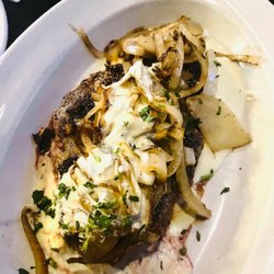 Landmark Grill - Ribeye with Gorgonzola cream and onion sauce.