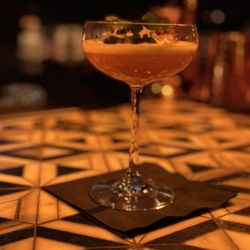 Seymour's - The Square Root cocktail: turmeric infused gin, carrot eau de vie, domaine de canton (ginger liqueur), carrot juice, lemon.