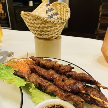 Mum Aroi - Khao niew moo ping and dipping sauce - Thai Near Me - Falls Church, Virginia Mum Aroi - Khao niew moo ping and dipping sauce - Thai Near Me - Falls Church, Virginia