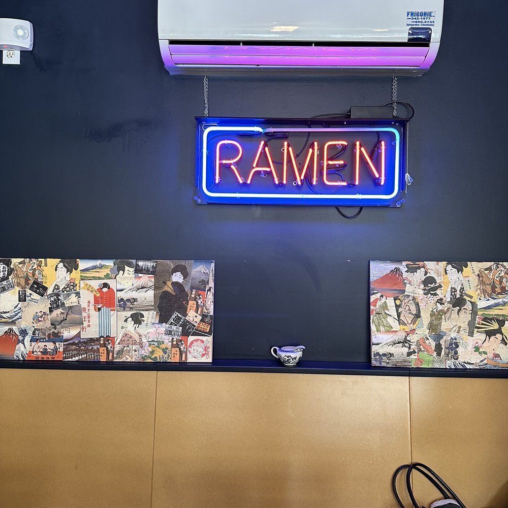 Kokkaku Ramen - a neon sign in a restaurant - Ramen Near Me - Sutton, Quebec Kokkaku Ramen - a neon sign in a restaurant - Ramen Near Me - Sutton, Quebec