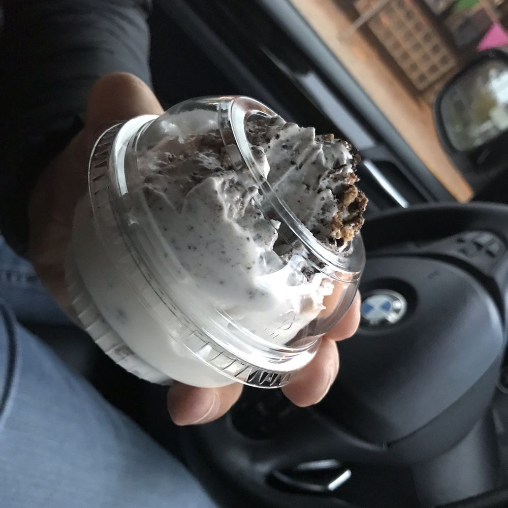 Uncle Ray's Dairyland - a hand holding a cup of ice cream - Ice Cream & Frozen Yogurt Near Me - Fenton, Michigan Uncle Ray's Dairyland - a hand holding a cup of ice cream - Ice Cream & Frozen Yogurt Near Me - Fenton, Michigan