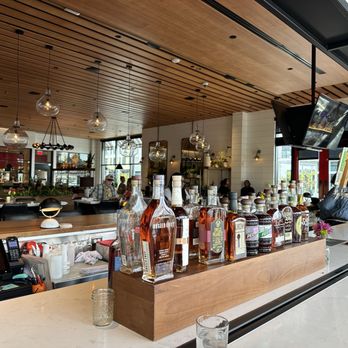 North Italia - Liquor display in front of multiple seats blocking access - Italian Near Me - Charlotte, North Carolina