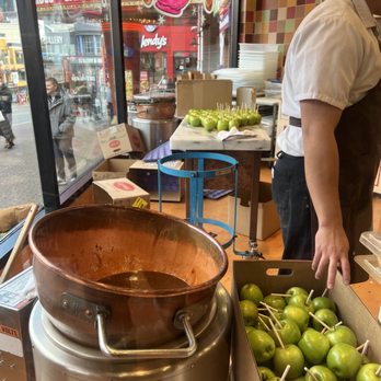 The Fudge Factory - a man preparing food in a kitchen - Candy Stores Near Me - Niagara Falls, Ontario The Fudge Factory - a man preparing food in a kitchen - Candy Stores Near Me - Niagara Falls, Ontario