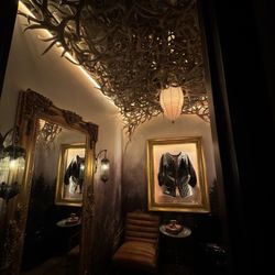 Trophy Room - I usually do not post bathroom pictures, but this one was very unique with numerous antlers overhead.