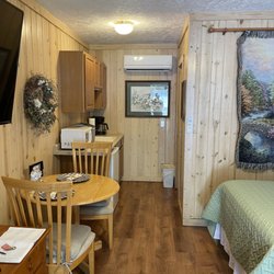The Dogwood Room with 2 Double Beds, Kitchenette, & private Bathroom with walk-in shower.