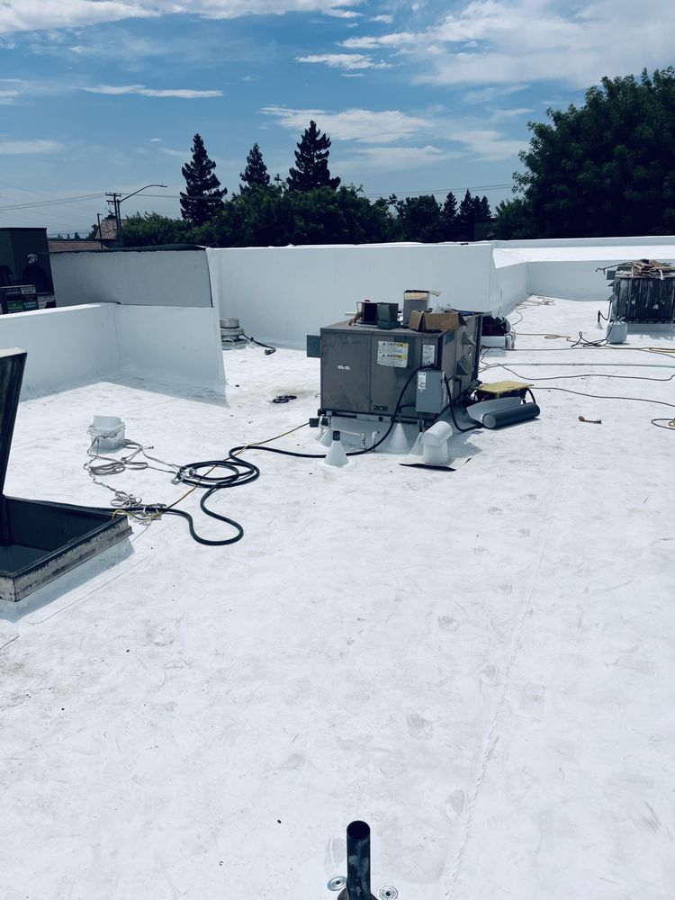 Slide of Ortiz Roofing