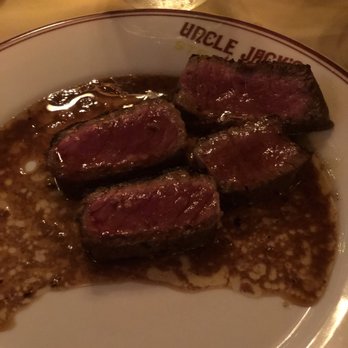 Uncle Jack's Steakhouse - The pool of juices the porterhouse laid in. I could swim in it. - Steakhouses Near Me - Bayside, New York Uncle Jack's Steakhouse - The pool of juices the porterhouse laid in. I could swim in it. - Steakhouses Near Me - Bayside, New York