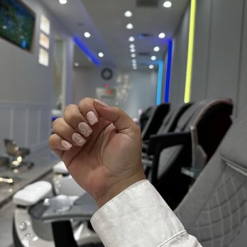 Durbin Nail Spa - OPI Lisbon Wants Moor with freestyle wavy lines and wacky line portrait - Nail Salons Near Me - St. Johns, Florida