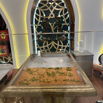 Hallab Pastry 1881 - a display in a glass case - Desserts Near Me - Anaheim, California Hallab Pastry 1881 - a display in a glass case - Desserts Near Me - Anaheim, California