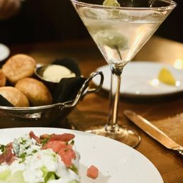 Wedge salad, those yummy yummy rolls and an amazing martini with hand, stuffed blue cheese olives