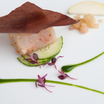 Signatures Restaurant - a plate of food on a white surface - French Near Me - Ottawa, Ontario Signatures Restaurant - a plate of food on a white surface - French Near Me - Ottawa, Ontario
